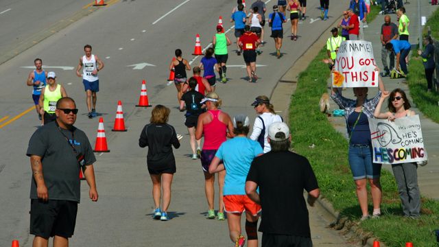 Fans, families cheer marathon runners