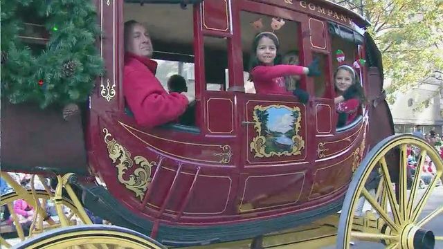 Raleigh Christmas Parade gets thousands into holiday spirit