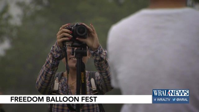 Visitors make the most of gloomy day at balloon festival