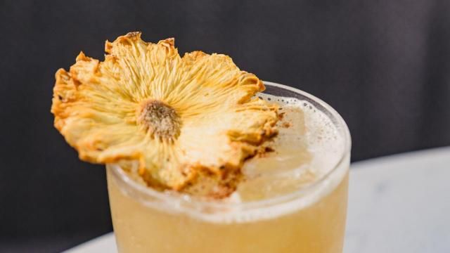 The Doctor's Orders cocktail, made with rum, blended scotch, pineapple, lemon, honey and nutmeg, is among the craft cocktails offered at The Willard, the rooftop lounge that opens Nov. 3, 2021 at the AC Hotel Raleigh Downtown. (Photo credit: Baxter Miller)
