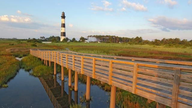 Walkway Over A Marsh To The Bodie Island Lighthouse