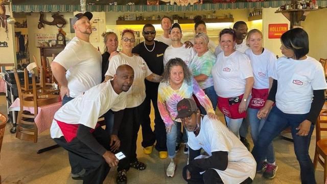 Usher with the staff of Big Ed's Restaurant