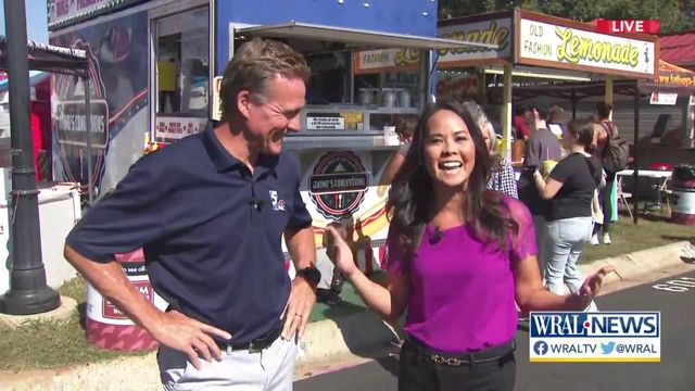 Renee and Jeff enjoy fried treats at NC State Fair