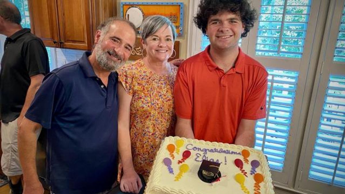 Mindy and her husband Tony celebrate Elias’ graduation.