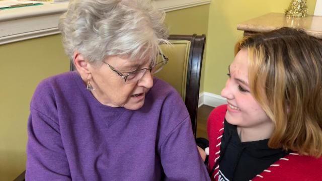 Alicia has a special moment with her Nana on Christmas Eve in her memory care facility.