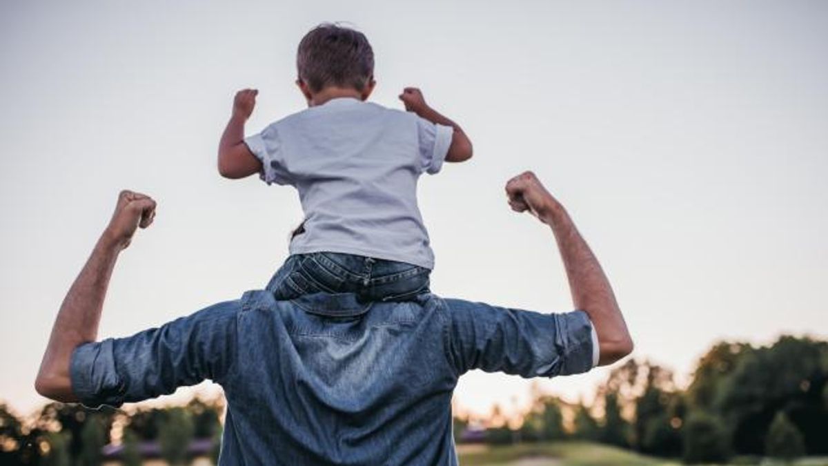 Dad and son outdoors