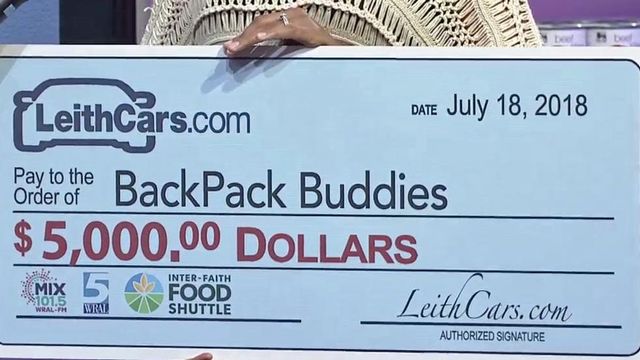 Leith Cars gives $5,000 to BackPack Buddies