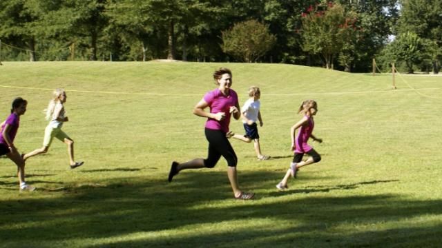 Stacy Lamb and her daughter in the Big Muddy Challenge