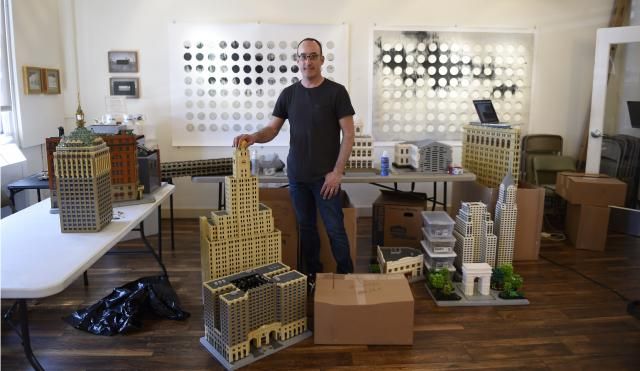 LEGO artist Jonathan Lopes with his New York City creations