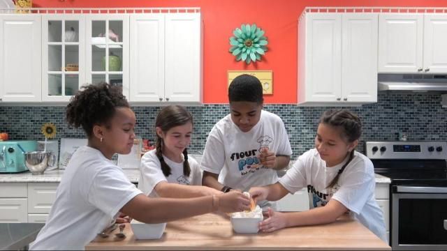 Flour Power Kids Cooking Studio chefs make marshmallow fruit dip