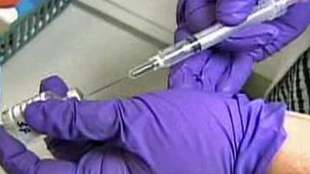 Mask recommends annual flu shots for most