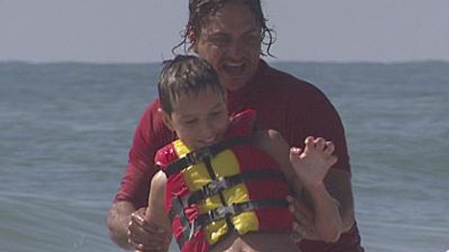 Surfing therapy helping children with autism