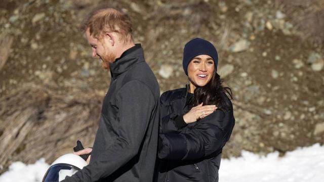 Britain's Prince Harry and Meghan, the Duke and Duchess of Sussex, walk together after Harry slid down the track on a skeleton sled a second time while attending an Invictus Games training camp, in Whistler, British Columbia, Thursday, Feb. 15, 2024. (Darryl Dyck/The Canadian Press via AP) Britain's Prince Harry and Meghan, the Duke and Duchess of Sussex, walk together after Harry slid down the track on a skeleton sled a second time while attending an Invictus Games training camp, in Whistler, British Columbia, Thursday, Feb. 15, 2024. (Darryl Dyck/The Canadian Press via AP)