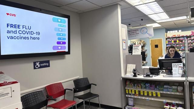 FILE - A sign for flu vaccination is displayed on a screen at a pharmacy store in Buffalo Grove, Ill., Tuesday, Feb. 13, 2024. Early estimates suggest flu shots are performing OK in the current U.S. winter flu season. The vaccines were around 40% effective in preventing adults from getting sick enough from the flu that they had to go to a doctor’s office, clinic or hospital, health officials said during a Centers for Disease Control and Prevention vaccines meeting Wednesday, Feb. 28, 2024. (AP Photo/Nam Y. Huh, File) FILE - A sign for flu vaccination is displayed on a screen at a pharmacy store in Buffalo Grove, Ill., Tuesday, Feb. 13, 2024. Early estimates suggest flu shots are performing OK in the current U.S. winter flu season. The vaccines were around 40% effective in preventing adults from getting sick enough from the flu that they had to go to a doctor’s office, clinic or hospital, health officials said during a Centers for Disease Control and Prevention vaccines meeting Wednesday, Feb. 28, 2024. (AP Photo/Nam Y. Huh, File)