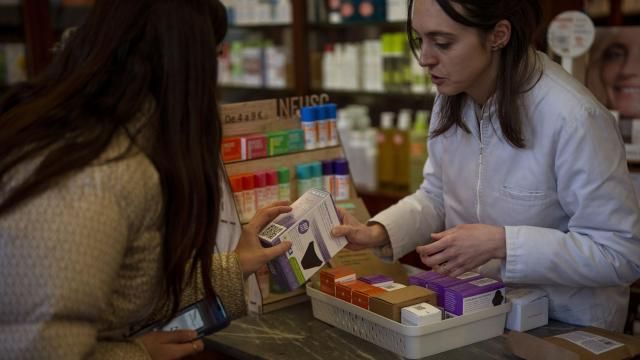A woman receives an underwear for periods free of charge at a pharmacy in Barcelona, Spain, Tuesday, March 5, 2024. Spain's Catalonia region rolled out this week a pioneering women's health initiative that offers millions of women reusable menstruation products for free. Some 2.5 million women in northeast Spain can receive one menstrual cup, one pair of underwear for periods, and two packages of cloth pads at local pharmacies free of charge. (AP Photo/Emilio Morenatti) A woman receives an underwear for periods free of charge at a pharmacy in Barcelona, Spain, Tuesday, March 5, 2024. Spain's Catalonia region rolled out this week a pioneering women's health initiative that offers millions of women reusable menstruation products for free. Some 2.5 million women in northeast Spain can receive one menstrual cup, one pair of underwear for periods, and two packages of cloth pads at local pharmacies free of charge. (AP Photo/Emilio Morenatti)