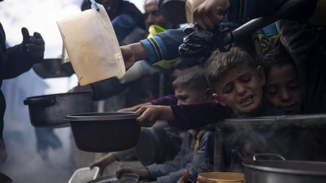 File - Palestinians line up for a free meal in Rafah, Gaza Strip, Friday, Feb. 16, 2024. (AP Photo/Fatima Shbair, File) File - Palestinians line up for a free meal in Rafah, Gaza Strip, Friday, Feb. 16, 2024. (AP Photo/Fatima Shbair, File)