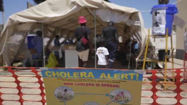 FILE - A family enters a tent set aside for cholera patients at a clinic in Harare, Zimbabwe, on Nov. 18, 2023. The World Health Organization has approved a new version of a widely used cholera vaccine that could help address a surge in cases that has depleted the global vaccine stockpile. In a decision last week, WHO authorized a new vaccine by EuBiologics, the only maker of the oral cholera vaccine for a global stockpile managed by the U.N. health agency and partners. (AP Photo/Tsvangirayi Mukwazhi, File) FILE - A family enters a tent set aside for cholera patients at a clinic in Harare, Zimbabwe, on Nov. 18, 2023. The World Health Organization has approved a new version of a widely used cholera vaccine that could help address a surge in cases that has depleted the global vaccine stockpile. In a decision last week, WHO authorized a new vaccine by EuBiologics, the only maker of the oral cholera vaccine for a global stockpile managed by the U.N. health agency and partners. (AP Photo/Tsvangirayi Mukwazhi, File)