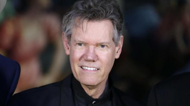 FILE - Randy Travis attends the announcement of the Country Music Hall of Fame inductees in Nashville, Tenn., on March 29, 2016. (AP Photo/Mark Humphrey, File) FILE - Randy Travis attends the announcement of the Country Music Hall of Fame inductees in Nashville, Tenn., on March 29, 2016. (AP Photo/Mark Humphrey, File)