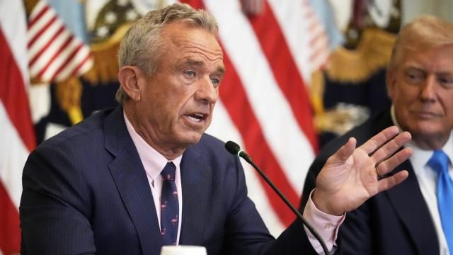 Health and Human Services Secretary Robert F. Kennedy Jr. speaks as President Donald Trump listens at an event to promote his proposal to improve Americans' access to their medical records in the East Room of the White House, Wednesday, July 30, 2025, in Washington. (AP Photo/Mark Schiefelbein)