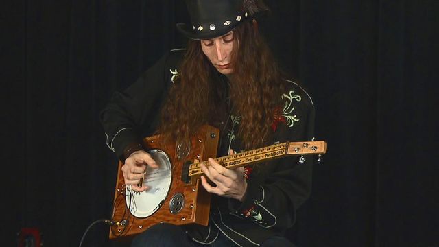 Creating music by playing unique guitars