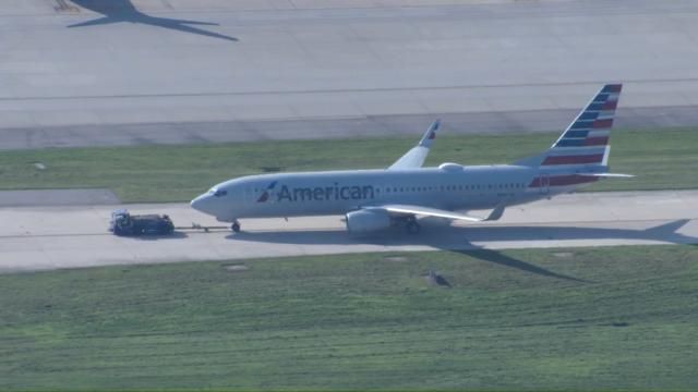 Crews towing plane off runway after American Airlines flight makes emergency landing at RDU Thursday morning