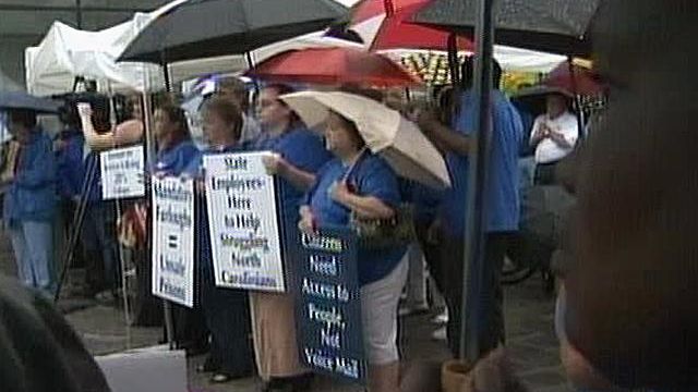 Web only: State employees rally against furloughs