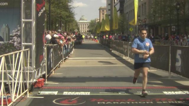 Runners pour across finish line
