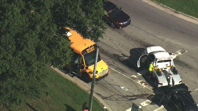 Sky 5 flies over a crash involving a school bus in Raleigh