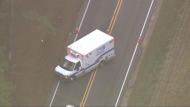 Sky 5 flies over overturned car in Knightdale