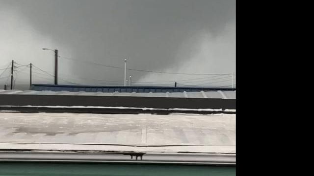 Raw: Waterspout off west end of Emerald Isle