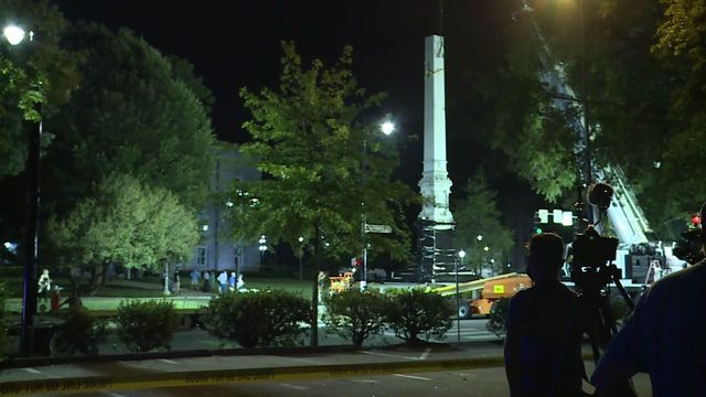 Crews continue work on removal of Confederate monument