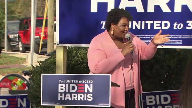 Stacey Abrams speaks at a rally in Raleigh