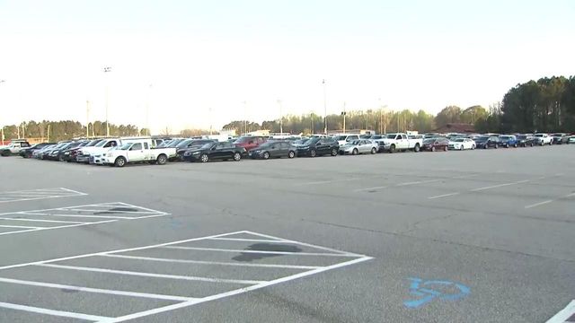 Lines of cars wait for vaccines in Johnston County