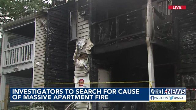 Residents get belongings out of burned apartments, 17 without homes
