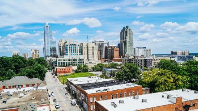 What to do in Raleigh. View of Raleigh skyline from the Dillon, on Hillsborough Street in the warehouse district. 