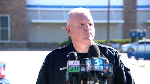 Concord police gather outside the Concord Mills Mall after shooting