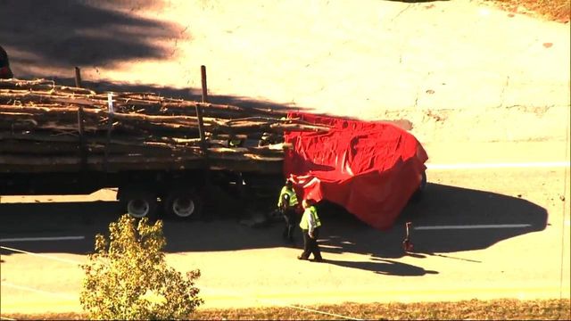 Sky 5 flies over log truck crash on US 64 near Knightdale