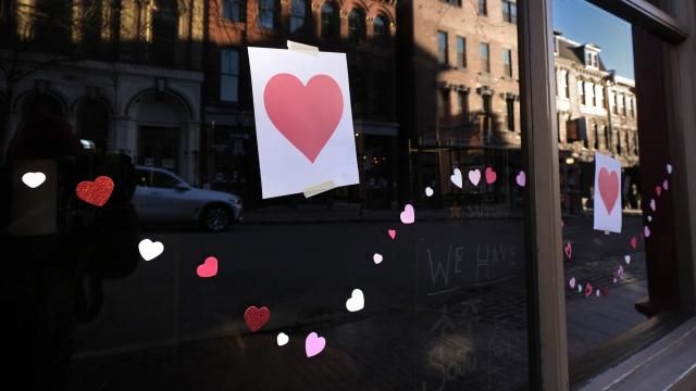 Valentine's Day Hearts decorate a storefront on Exchange Street, Wednesday, Feb. 14, 2024, in Portland, Maine. The public has helped honor the memory of Kevin Fahrman, the Valentine's Day Bandit who secretly hung hundreds of red paper hearts throughout the city every February 14th. Farman died last year. (AP Photo/Robert F. Bukaty) Valentine's Day Hearts decorate a storefront on Exchange Street, Wednesday, Feb. 14, 2024, in Portland, Maine. The public has helped honor the memory of Kevin Fahrman, the Valentine's Day Bandit who secretly hung hundreds of red paper hearts throughout the city every February 14th. Farman died last year. (AP Photo/Robert F. Bukaty)