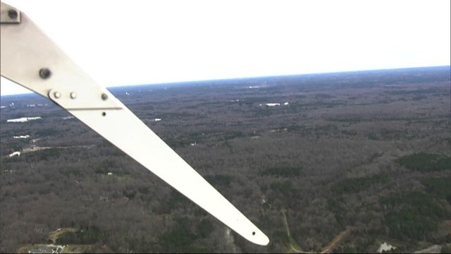 Sky 5 flies over a police scene