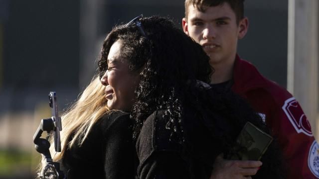 Women embrace after a news conference where law enforcement officials announced that the body of 11-year-old Audrii Cunningham was found in the Trinity River near her home in Livingston, Texas, Tuesday, Feb. 20, 2024, in Livingston. (Jason Fochtman/Houston Chronicle via AP) Women embrace after a news conference where law enforcement officials announced that the body of 11-year-old Audrii Cunningham was found in the Trinity River near her home in Livingston, Texas, Tuesday, Feb. 20, 2024, in Livingston. (Jason Fochtman/Houston Chronicle via AP)