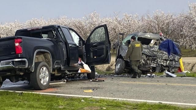 The site of a head-on crash involving a van and a pickup truck where eight people were killed is checked in Madera County, Calif., Friday, Feb. 23, 2024. California Highway Patrol Officer Javier Ruvalcaba told the Fresno Bee that seven of those killed were farmworkers traveling in a van. The other person killed was in a pickup truck, he said. (Anthony Galaviz/The Fresno Bee via AP) The site of a head-on crash involving a van and a pickup truck where eight people were killed is checked in Madera County, Calif., Friday, Feb. 23, 2024. California Highway Patrol Officer Javier Ruvalcaba told the Fresno Bee that seven of those killed were farmworkers traveling in a van. The other person killed was in a pickup truck, he said. (Anthony Galaviz/The Fresno Bee via AP)