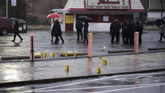 Evidence markers are seen following a shooting in Northeast Philadelphia on Wednesday, March 6, 2024. Four shootings over four days in Philadelphia left three dead and 12 injured, many of them children — violence that put renewed focus on safety within the sprawling mass transit system and gave ammunition to critics of the city's progressive chief prosecutor. (AP Photo/Joe Lamberti) Evidence markers are seen following a shooting in Northeast Philadelphia on Wednesday, March 6, 2024. Four shootings over four days in Philadelphia left three dead and 12 injured, many of them children — violence that put renewed focus on safety within the sprawling mass transit system and gave ammunition to critics of the city's progressive chief prosecutor. (AP Photo/Joe Lamberti)