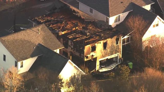 Sky 5 flies over home damaged by intense fire in North Raleigh