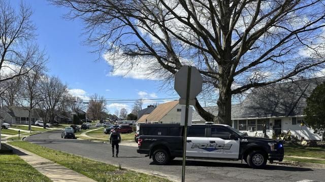 Police patrol a neighborhood after a shooting on Saturday, March 16, 2024 in Levittown, Pa. Several people have been shot after gunfire erupted in a suburban Philadelphia township, prompting authorities to warn residents to hunker down in their homes and forcing cancellation of a St. Patrick’s Day parade and a children’s theme park. (AP Photo/Michael Catalini) Police patrol a neighborhood after a shooting on Saturday, March 16, 2024 in Levittown, Pa. Several people have been shot after gunfire erupted in a suburban Philadelphia township, prompting authorities to warn residents to hunker down in their homes and forcing cancellation of a St. Patrick’s Day parade and a children’s theme park. (AP Photo/Michael Catalini)