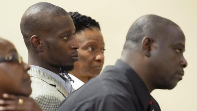 FILE - Michael Corey Jenkins, center, and Eddie Terrell Parker, right, listen as one of six former Mississippi law officers pleads guilty to state charges at the Rankin County Circuit Court in Brandon, Miss., Aug. 14, 2023. The two Black men who were tortured by six former Mississippi law enforcement officers in a violent episode last year called Monday, March 18, 2024 for a federal judge to impose strict penalties at sentencing hearings set to occur this week. (AP Photo/Rogelio V. Solis, file) FILE - Michael Corey Jenkins, center, and Eddie Terrell Parker, right, listen as one of six former Mississippi law officers pleads guilty to state charges at the Rankin County Circuit Court in Brandon, Miss., Aug. 14, 2023. The two Black men who were tortured by six former Mississippi law enforcement officers in a violent episode last year called Monday, March 18, 2024 for a federal judge to impose strict penalties at sentencing hearings set to occur this week. (AP Photo/Rogelio V. Solis, file)