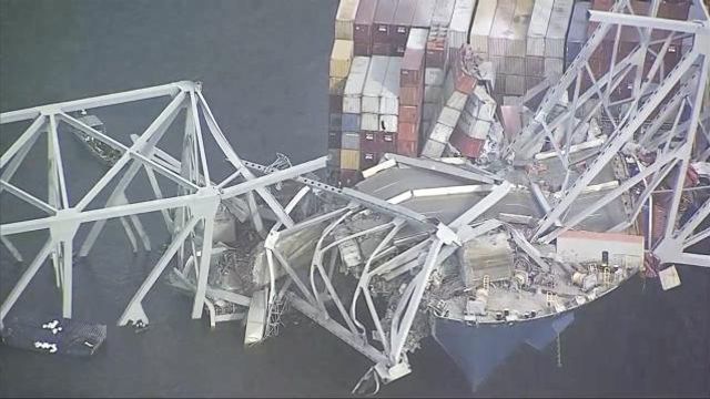 Parts of the Francis Scott Key Bridge remain after a container ship collided with one of the bridge’s supports Tuesday, March 26, 2024 in Baltimore. The major bridge in Baltimore snapped and collapsed after a container ship rammed into it early Tuesday, and several vehicles fell into the river below. Rescuers were searching for multiple people in the water. (WJLA via AP) Parts of the Francis Scott Key Bridge remain after a container ship collided with one of the bridge’s supports Tuesday, March 26, 2024 in Baltimore. The major bridge in Baltimore snapped and collapsed after a container ship rammed into it early Tuesday, and several vehicles fell into the river below. Rescuers were searching for multiple people in the water. (WJLA via AP)