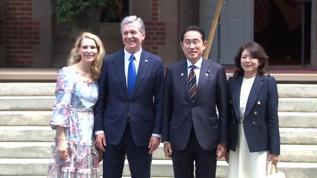 Japan's prime minister, wife dine with Coopers at the governor's mansion