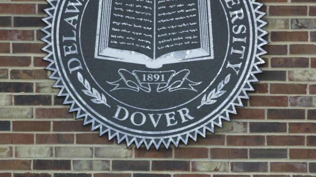FILE - This Sept., 21, 2007 file photo shows a sign posted at the front gate of Delaware State University in Dover, Del. An 18-year-old woman died after she was shot on the campus of Delaware State University on Sunday, April 21, 2024 authorities said. (AP Photo/Carolyn Kaster, File) FILE - This Sept., 21, 2007 file photo shows a sign posted at the front gate of Delaware State University in Dover, Del. An 18-year-old woman died after she was shot on the campus of Delaware State University on Sunday, April 21, 2024 authorities said. (AP Photo/Carolyn Kaster, File)