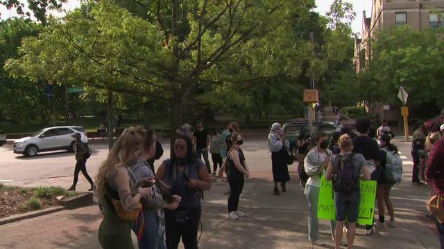 Pro-Palestinian protesters marching near UNC 