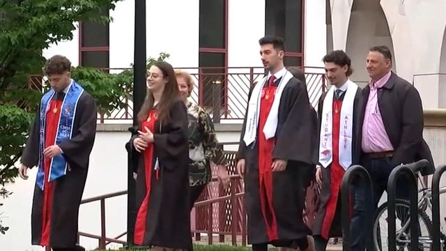 Quintuplets graduating from the same school on the same day.
